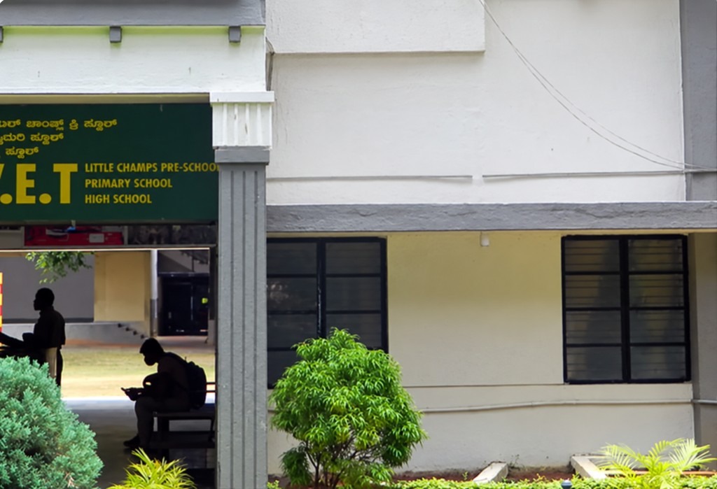 Exterior view of VET School JP Nagar, with the main entrance and school gardens