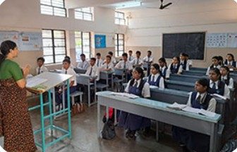 A teacher conducting a lesson in a classroom