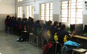 Students working at computers in the school computer lab